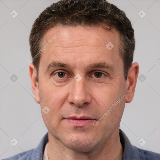 Neutral white adult male with short  brown hair and brown eyes