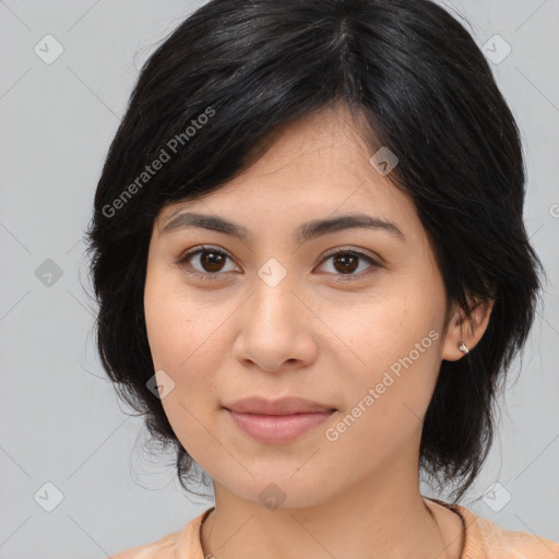 Joyful asian young-adult female with medium  brown hair and brown eyes