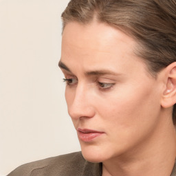 Neutral white young-adult female with short  brown hair and brown eyes