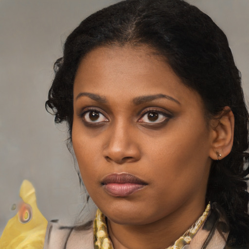 Neutral black young-adult female with long  black hair and brown eyes