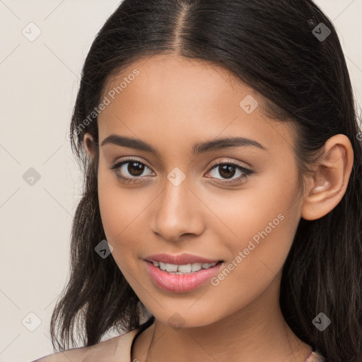 Joyful white young-adult female with long  brown hair and brown eyes