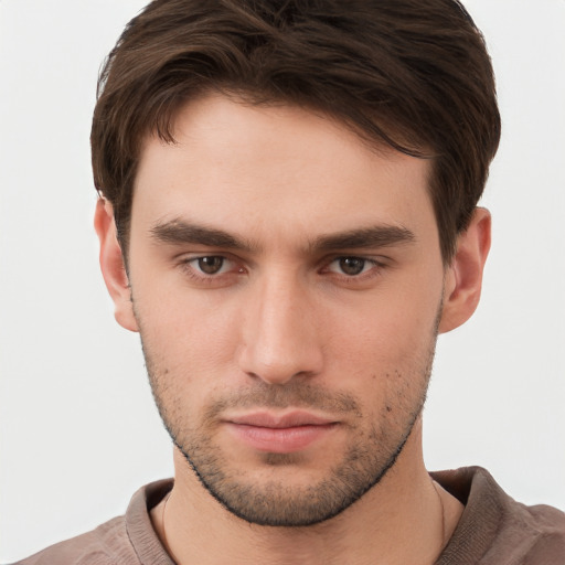 Neutral white young-adult male with short  brown hair and brown eyes