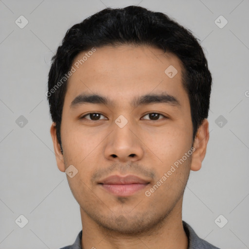 Neutral latino young-adult male with short  black hair and brown eyes