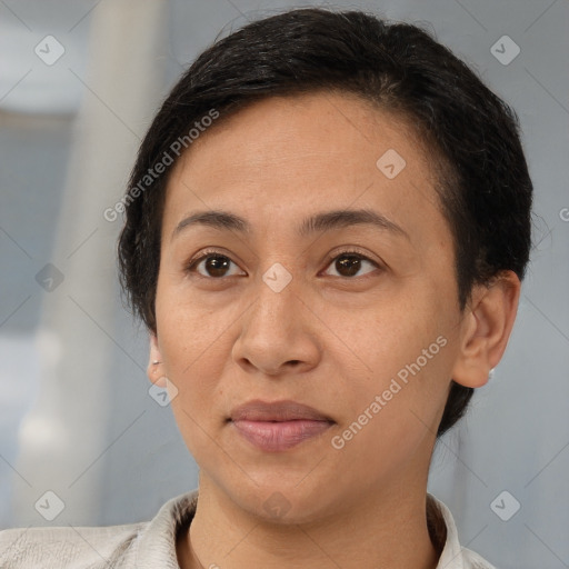 Joyful white adult female with short  brown hair and brown eyes