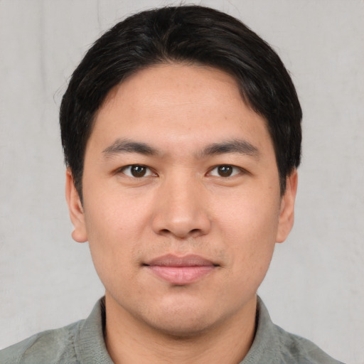 Neutral asian young-adult male with short  black hair and brown eyes