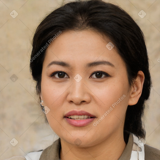 Joyful asian young-adult female with medium  brown hair and brown eyes