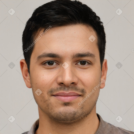 Joyful latino young-adult male with short  brown hair and brown eyes