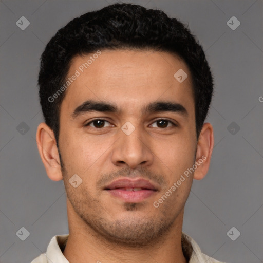 Joyful latino young-adult male with short  brown hair and brown eyes