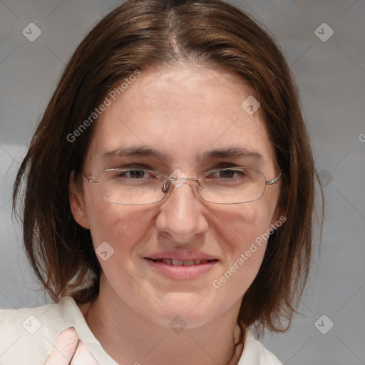 Joyful white adult female with medium  brown hair and brown eyes