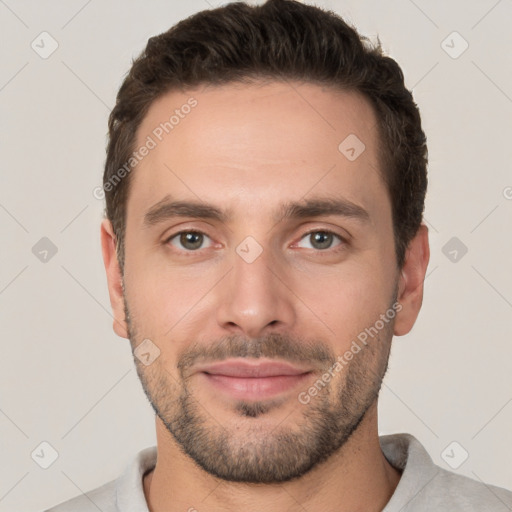 Joyful white young-adult male with short  brown hair and brown eyes