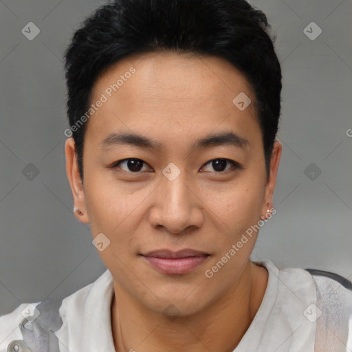 Joyful asian young-adult male with short  black hair and brown eyes