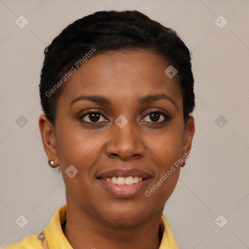 Joyful black young-adult female with short  brown hair and brown eyes