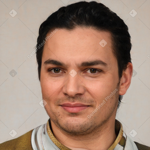 Joyful white young-adult male with short  black hair and brown eyes