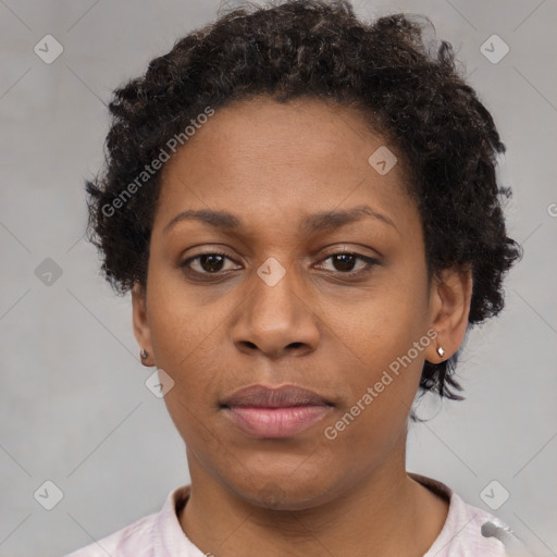 Neutral black young-adult female with short  brown hair and brown eyes