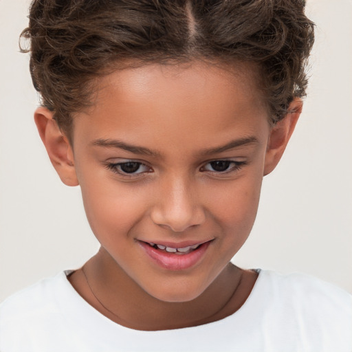 Joyful white child female with short  brown hair and brown eyes