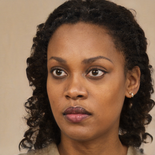 Neutral black young-adult female with long  black hair and brown eyes