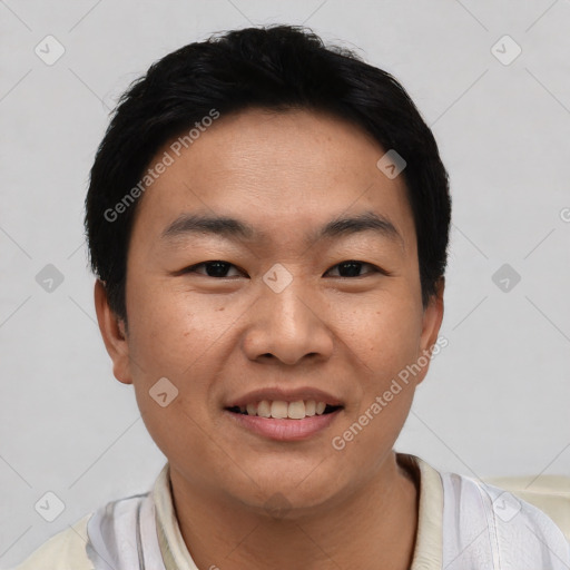 Joyful asian young-adult male with short  black hair and brown eyes