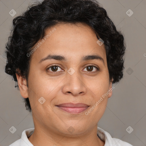 Joyful white adult female with short  brown hair and brown eyes