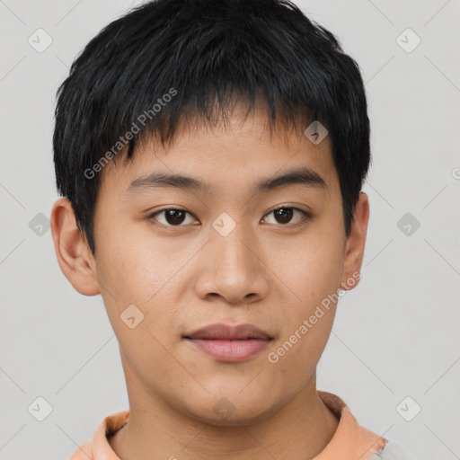 Joyful asian young-adult male with short  brown hair and brown eyes