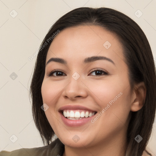 Joyful white young-adult female with long  brown hair and brown eyes