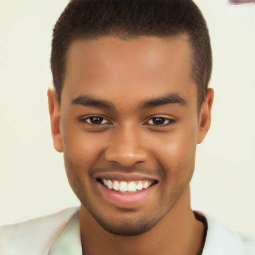 Joyful latino young-adult male with short  brown hair and brown eyes