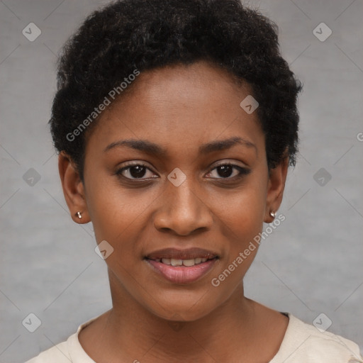 Joyful black young-adult female with short  black hair and brown eyes