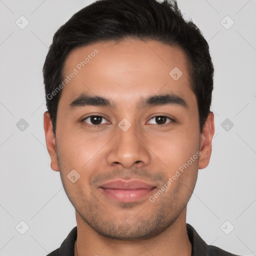 Joyful white young-adult male with short  black hair and brown eyes