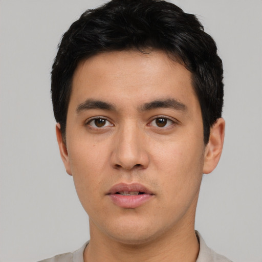 Neutral white young-adult male with short  black hair and brown eyes