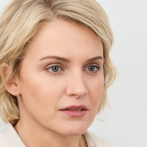 Neutral white young-adult female with medium  brown hair and blue eyes