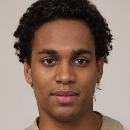 Neutral latino young-adult male with short  brown hair and brown eyes