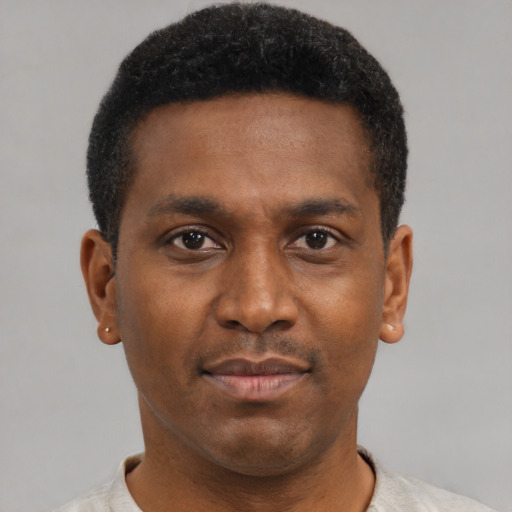 Neutral black young-adult male with short  brown hair and brown eyes