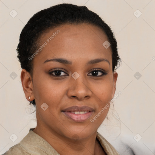 Joyful black young-adult female with short  brown hair and brown eyes