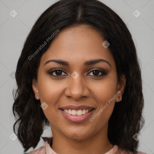 Joyful black young-adult female with medium  brown hair and brown eyes