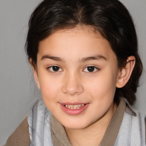 Joyful white child female with medium  brown hair and brown eyes