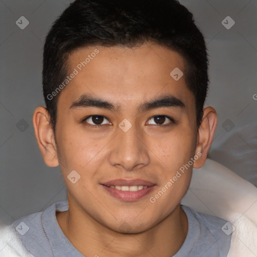 Joyful latino young-adult male with short  brown hair and brown eyes