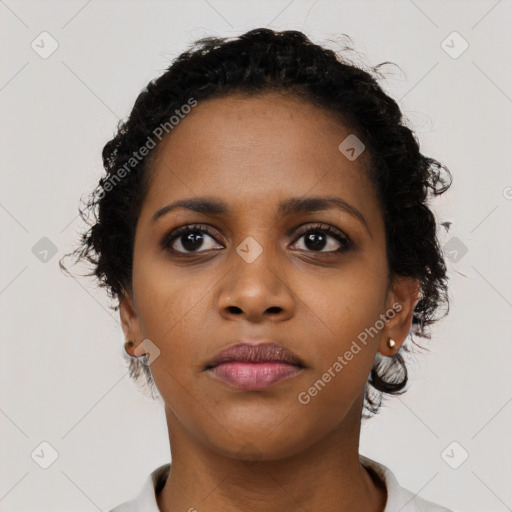 Neutral black young-adult female with short  brown hair and brown eyes