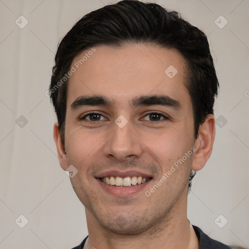 Joyful white young-adult male with short  black hair and brown eyes