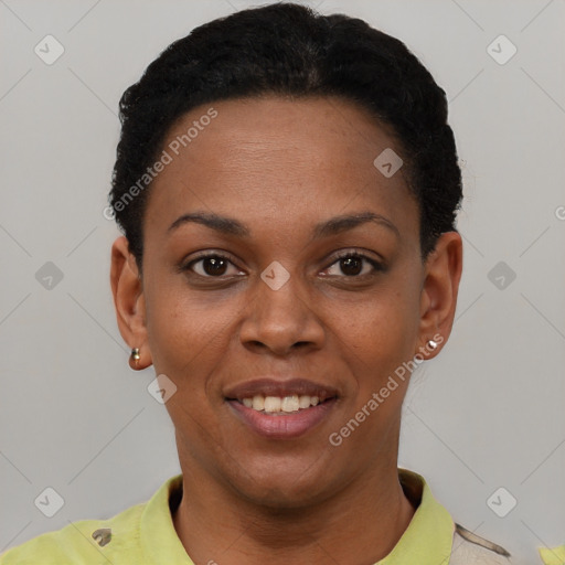 Joyful black young-adult female with short  black hair and brown eyes