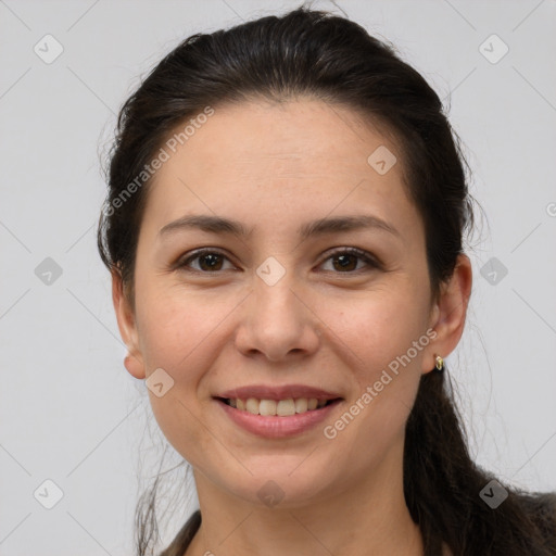 Joyful white young-adult female with long  brown hair and brown eyes