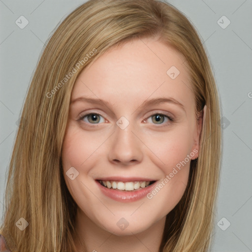 Joyful white young-adult female with long  brown hair and blue eyes