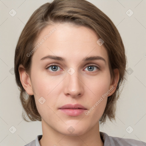 Neutral white young-adult female with medium  brown hair and grey eyes