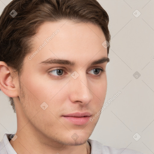 Neutral white young-adult male with short  brown hair and grey eyes