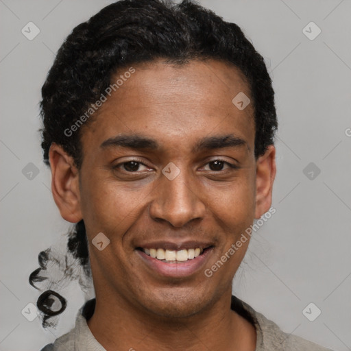 Joyful latino young-adult male with short  black hair and brown eyes