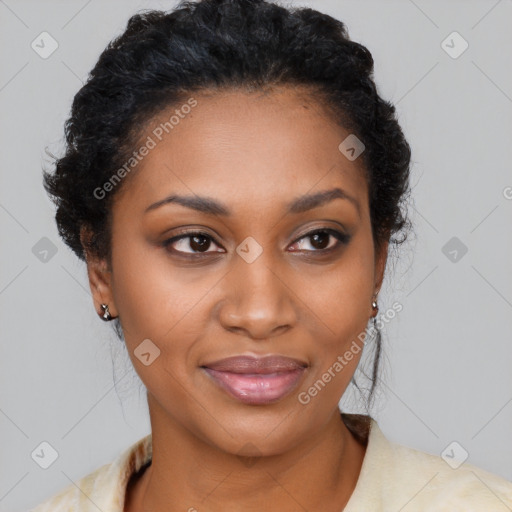 Joyful black young-adult female with medium  black hair and brown eyes