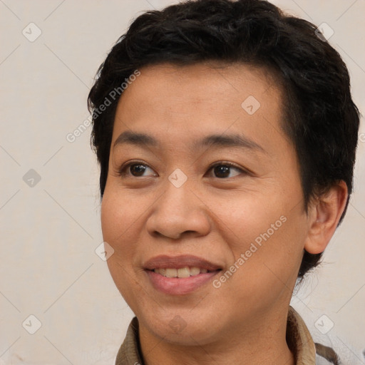 Joyful white adult female with short  brown hair and brown eyes