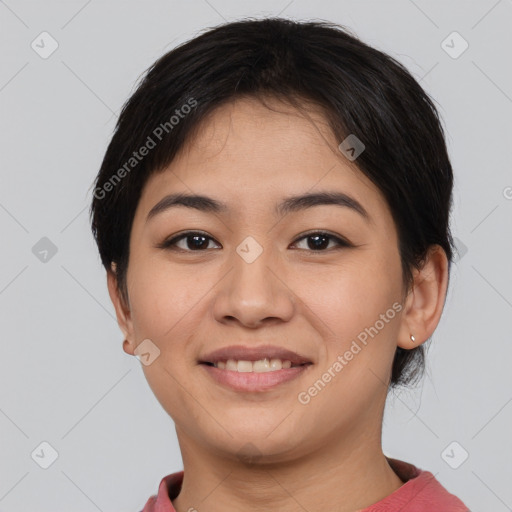 Joyful asian young-adult female with short  brown hair and brown eyes