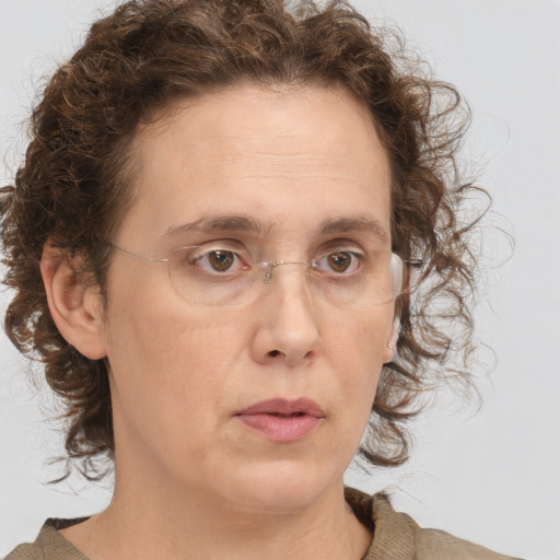 Neutral white adult female with medium  brown hair and brown eyes