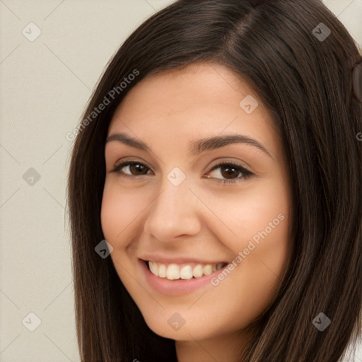 Joyful white young-adult female with long  brown hair and brown eyes