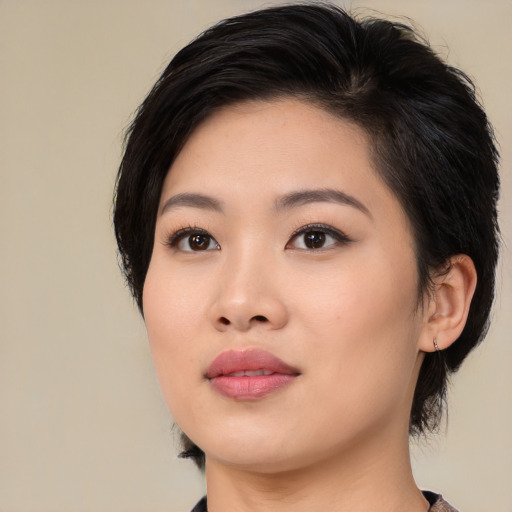 Neutral asian young-adult female with medium  black hair and brown eyes