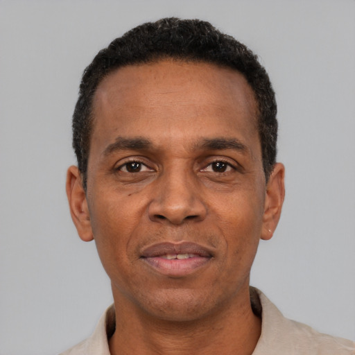 Neutral black adult male with short  black hair and brown eyes